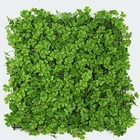 Sun rendent les feuilles artificielles résistantes de 4 couches de faux mur irréel de plante verte